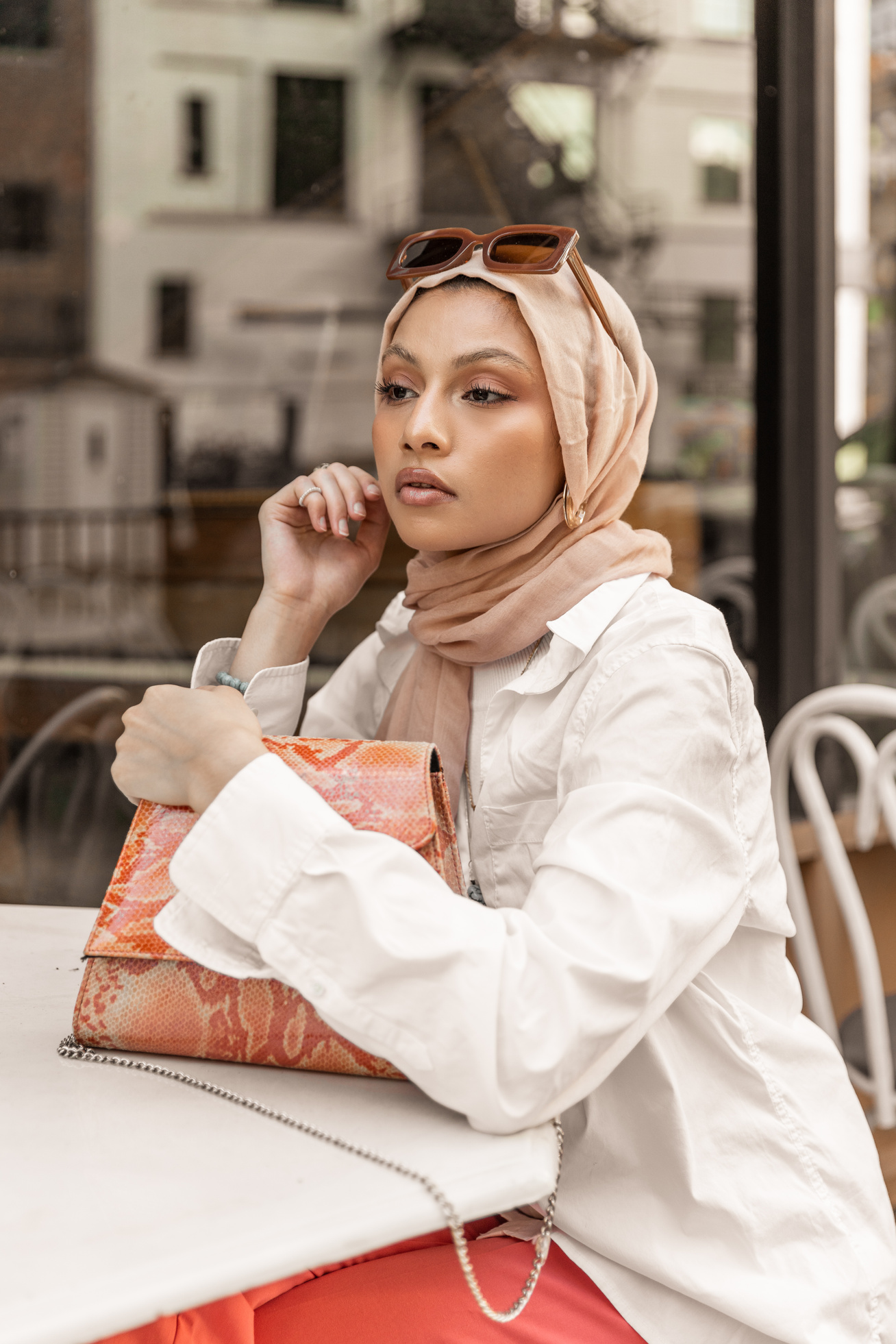 Portrait of Stylish Woman Wearing a Hijab in the City
